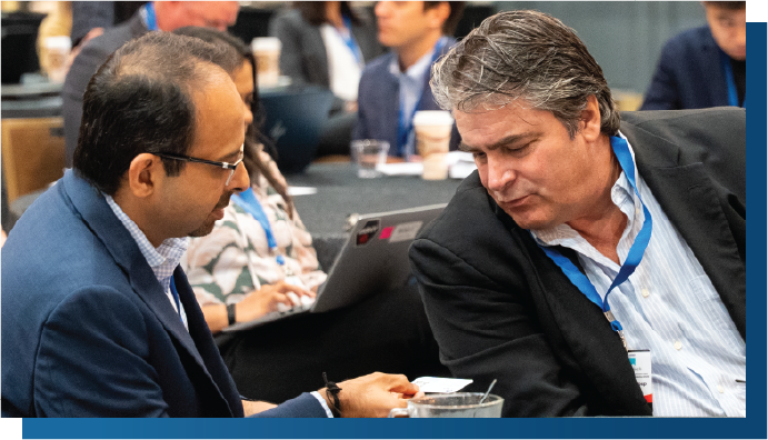 Delegates networking at AI in Oil and Gas conference, Panelists discussing machine learning applications during AI in Oil and Gas conference, Professional conversation during energy technology summit