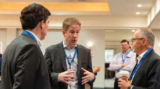 Industry leaders networking and discussing digital transformation in AI oil and gas conference, AI oil and gas leaders, Energy innovation networking