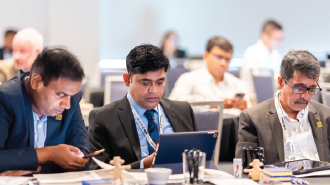 Delegates analyzing digital transformation strategies during AI in Oil and Gas conference, AI in Oil and Gas conference, Oil and gas technology summit