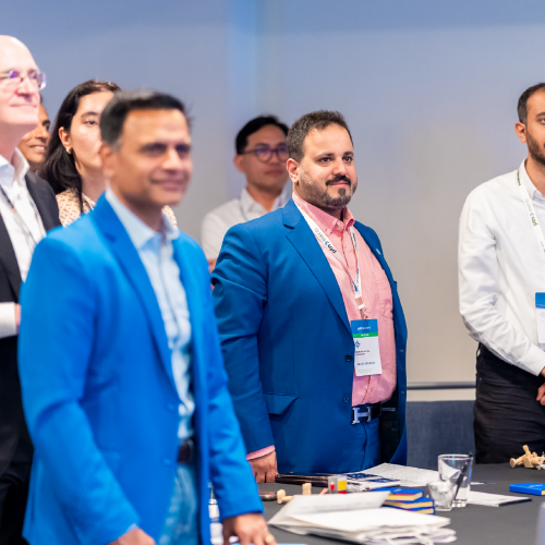 enterprise conference, industry gathering, delegates discussing digital strategy and automation